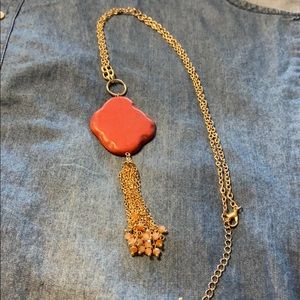 Long gold necklace